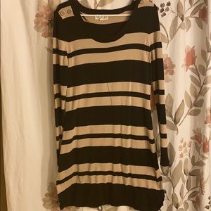 Knee length sweater dress.